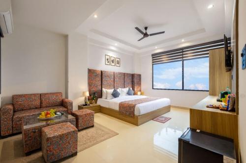 Ένα ή περισσότερα κρεβάτια σε δωμάτιο στο Noida business suites 141