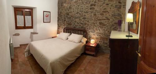 Giường trong phòng chung tại Cal correu Hort - Xida