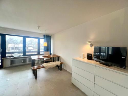 Et tv og/eller underholdning på Ferienappartement Sodki