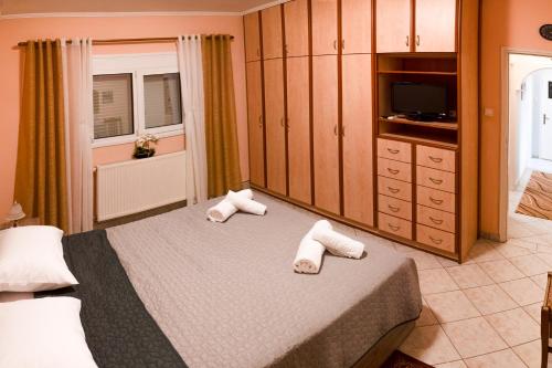 Ένα ή περισσότερα κρεβάτια σε δωμάτιο στο Katherine Home