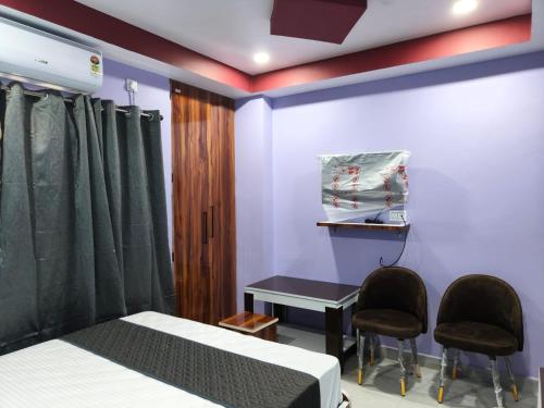 Cama o camas de una habitación en Hotel Sky Grand