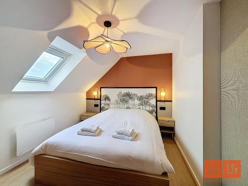 Llit o llits en una habitació de La Belle Marée
