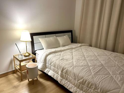 Postel nebo postele na pokoji v ubytování 온담펜션