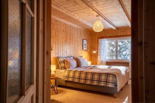 Postel nebo postele na pokoji v ubytování A&Y Chalet Davos Central