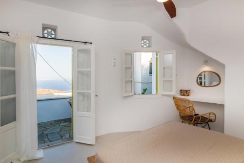 En eller flere senge i et værelse på Arnadian Living Experience