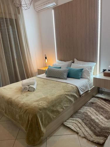 Postel nebo postele na pokoji v ubytování Joy cozy apartment