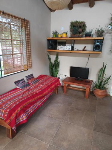 En eller flere senge i et værelse på Atelier del Monte