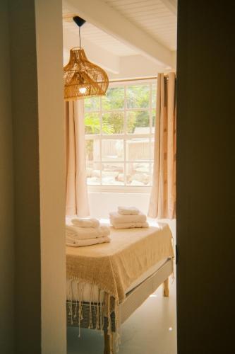 Postel nebo postele na pokoji v ubytování The Green Turtle Eco Lodge