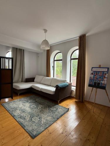 En eller flere senge i et værelse på Snagov Retreat