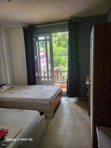 Postel nebo postele na pokoji v ubytování Lakaz