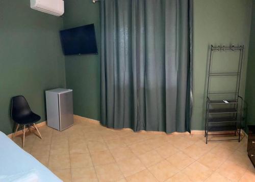 Et tv og/eller underholdning på Tirana Rooms