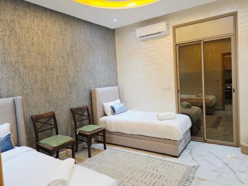 Postel nebo postele na pokoji v ubytování Azur appartement essaouira