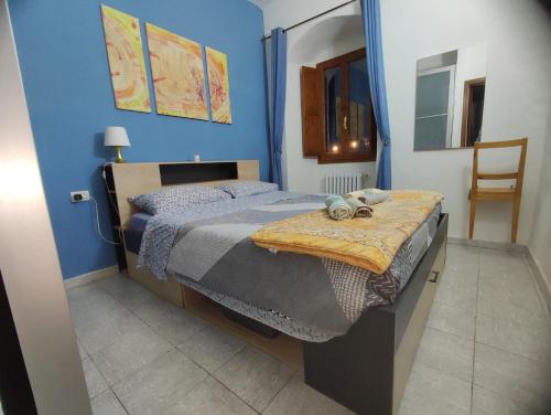 Postel nebo postele na pokoji v ubytování Appartamento Gigio - Incisa Valdarno