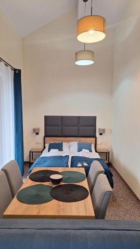 En eller flere senge i et værelse på Skalnica- apartamenty z widokiem na góry, przy szlakach