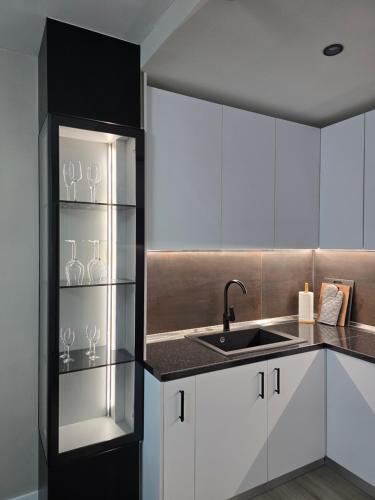 Η κουζίνα ή μικρή κουζίνα στο Modern Comfort Spot Apartments