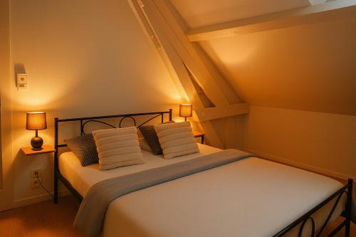 Ένα ή περισσότερα κρεβάτια σε δωμάτιο στο Maison le " Ber-So " proche du Zoo Beauval