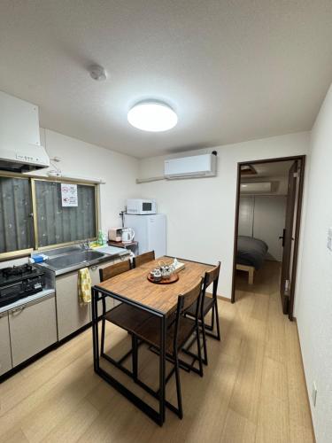 Η κουζίνα ή μικρή κουζίνα στο 羽憩館 Hakeikan KIX