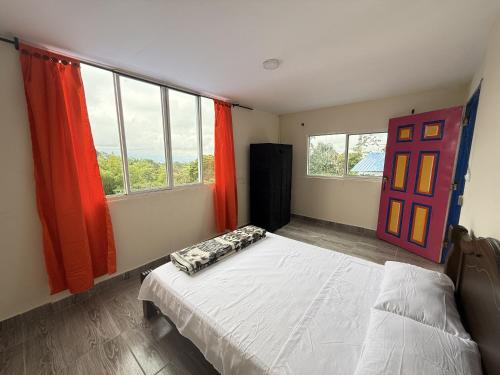 Postel nebo postele na pokoji v ubytování Mirador Verde By Nala