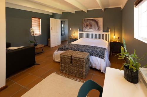 Postel nebo postele na pokoji v ubytování LaVera Oriole Cottage