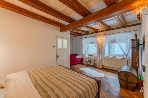 En eller flere senge i et værelse på Heritage Loft 1735