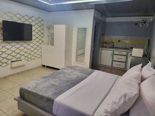 Fotografija v galeriji nastanitve Ndouha House v mestu Bafoussam