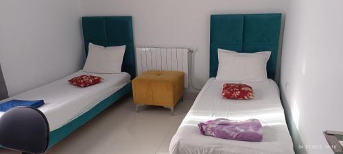 Postel nebo postele na pokoji v ubytování FUFA Haute standing appartment S2 center Monastir