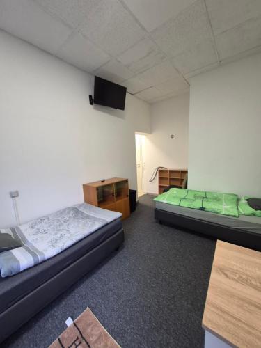 Postel nebo postele na pokoji v ubytování Unterkunft SaarGlück