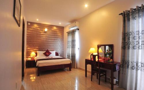 Giường trong phòng chung tại rubyhotel