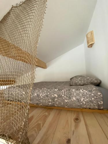 Llit o llits en una habitació de Studio Pouchuc