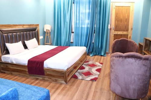 Ένα ή περισσότερα κρεβάτια σε δωμάτιο στο Blest Inn Kasol