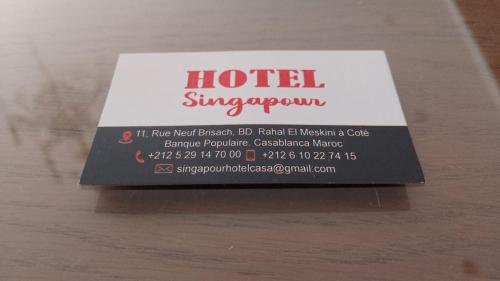 Een certificaat, prijs of ander document dat getoond wordt bij SINGAPOUR MAROC