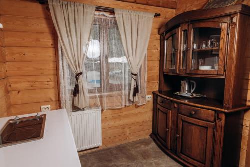 Postel nebo postele na pokoji v ubytování Готель Пацьорка