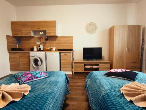 Ένα ή περισσότερα κρεβάτια σε δωμάτιο στο Apartmány Chalúpkova ulica Prešov - Solivar