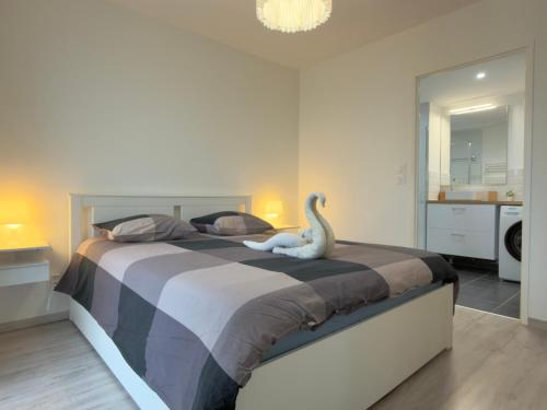 En eller flere senge i et værelse på Le Mignon - T2 - 4 personnes - Combe Persil