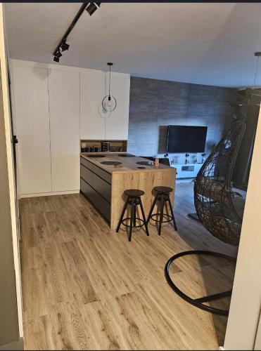 Кухня или мини-кухня в Apartament z ogródkiem wysoki standard Szczecin Centrum Północ
