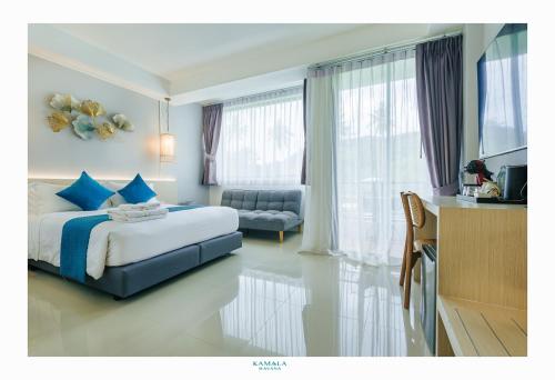 Ένα ή περισσότερα κρεβάτια σε δωμάτιο στο Kamala Havana Hotel and Cafe