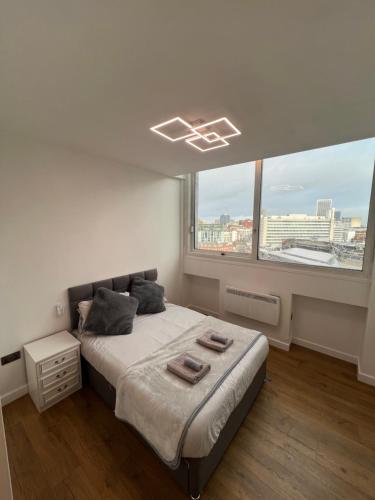 Ένα ή περισσότερα κρεβάτια σε δωμάτιο στο Private Ensuite- Shared Living- City Centre