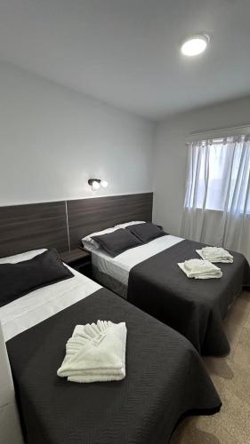 Ένα ή περισσότερα κρεβάτια σε δωμάτιο στο New Araucano