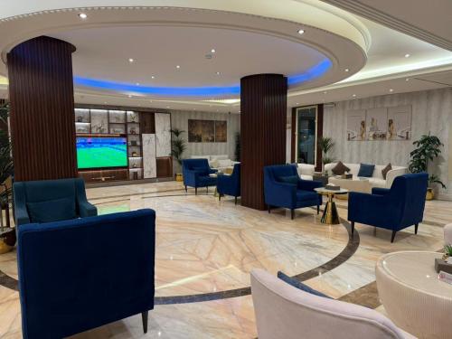 Μια τηλεόραση ή/και κέντρο ψυχαγωγίας στο اجنحة لايف للشقق المخدومة