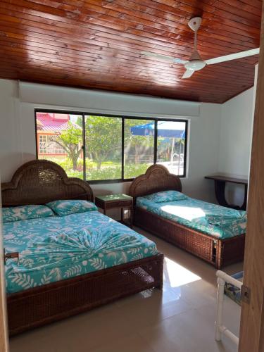 Postel nebo postele na pokoji v ubytování Cabaña - Condominio El Rincón del Edén