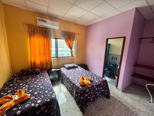 Postel nebo postele na pokoji v ubytování La Casa de Jeimy