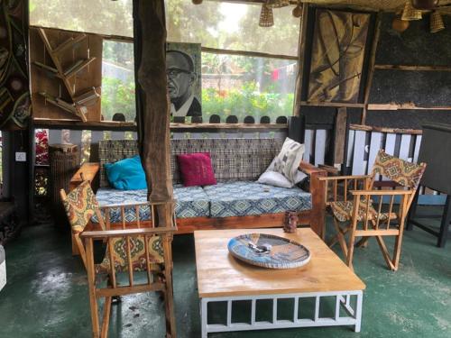 Posezení v ubytování Ikirunga Art Center