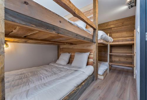 Una cama o camas en una habitación de Camp de Base - retraite d'exception 16 personnes