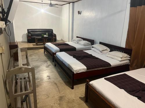 Postel nebo postele na pokoji v ubytování Hotel Greenmount