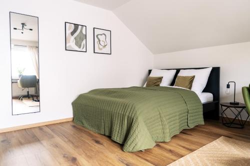 En eller flere senge i et værelse på Apartment Manu