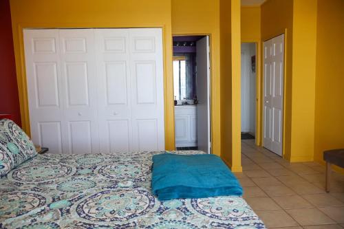 En eller flere senge i et værelse på Vincia Blaize