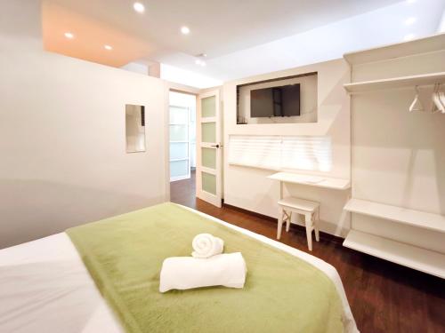 Giường trong phòng chung tại Apartamento en Terrassa en alquiler vacacional