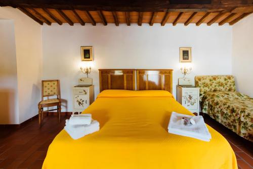 Giường trong phòng chung tại Casale Pievecchia, Santa Fiora