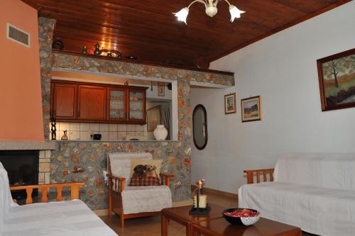 Ένα ή περισσότερα κρεβάτια σε δωμάτιο στο Giotas home near Meteora