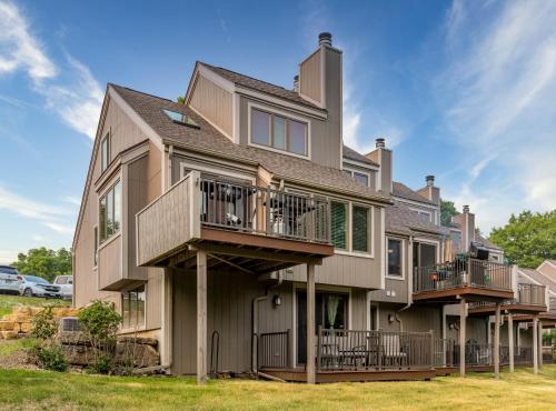 a large house with balconies on the side of it at Hideaway Cove in Galena